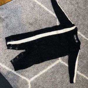 Black footsie with a white strip fur 3m
